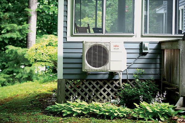A heat pump mounted on a home.